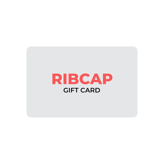 A light gray gift card with rounded corners, featuring the word 'RIBCAP' in coral-red uppercase letters and 'GIFT CARD' in smaller black uppercase letters below, centered on a white background.